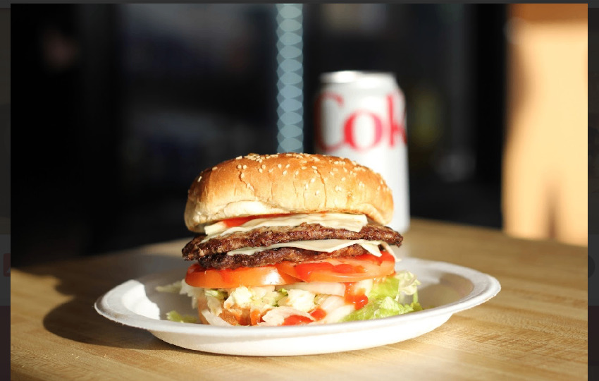 Double cheeseburger with lettuce and tomato